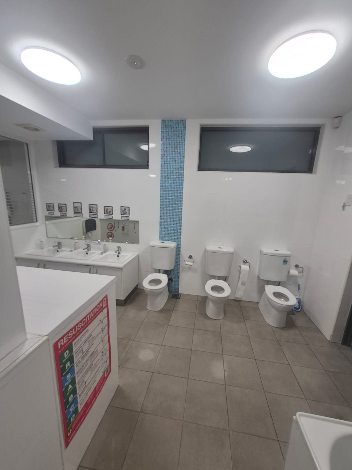 Children's bathroom with low basins and toilets, cleaned and sanitised